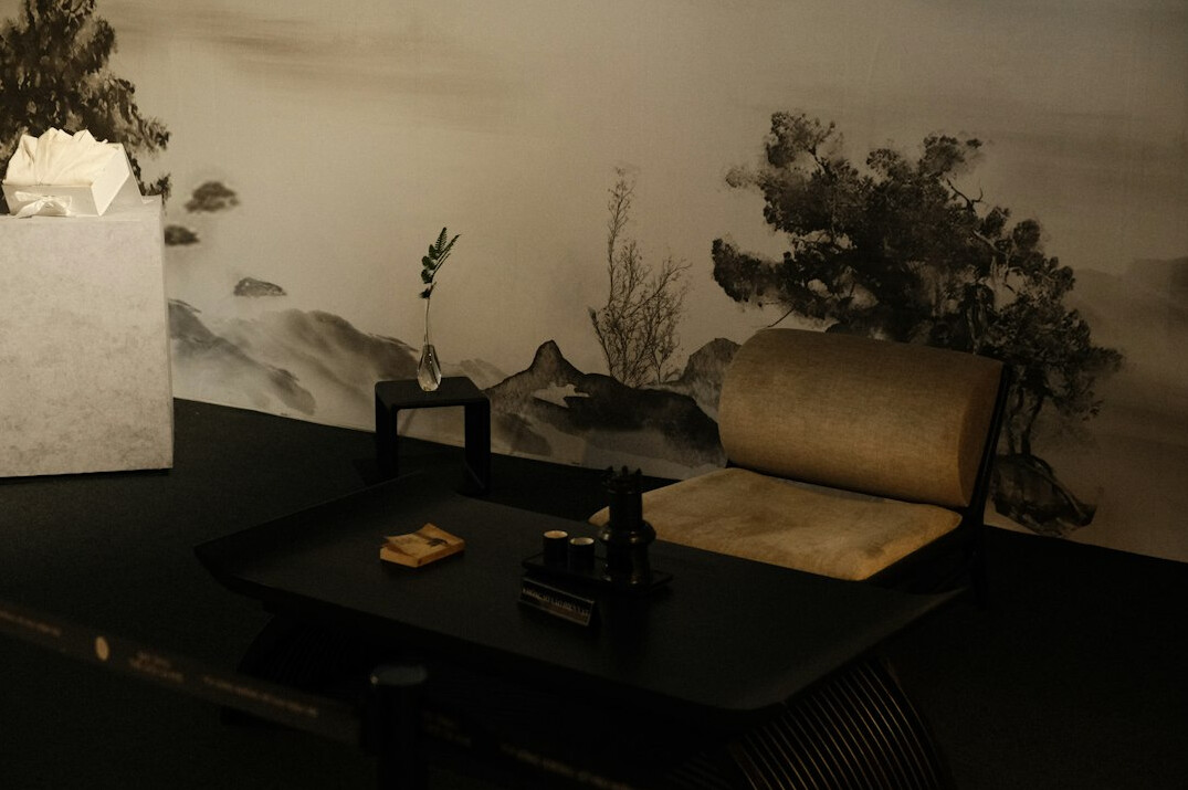 Old maps and archival documents laid on a wooden table